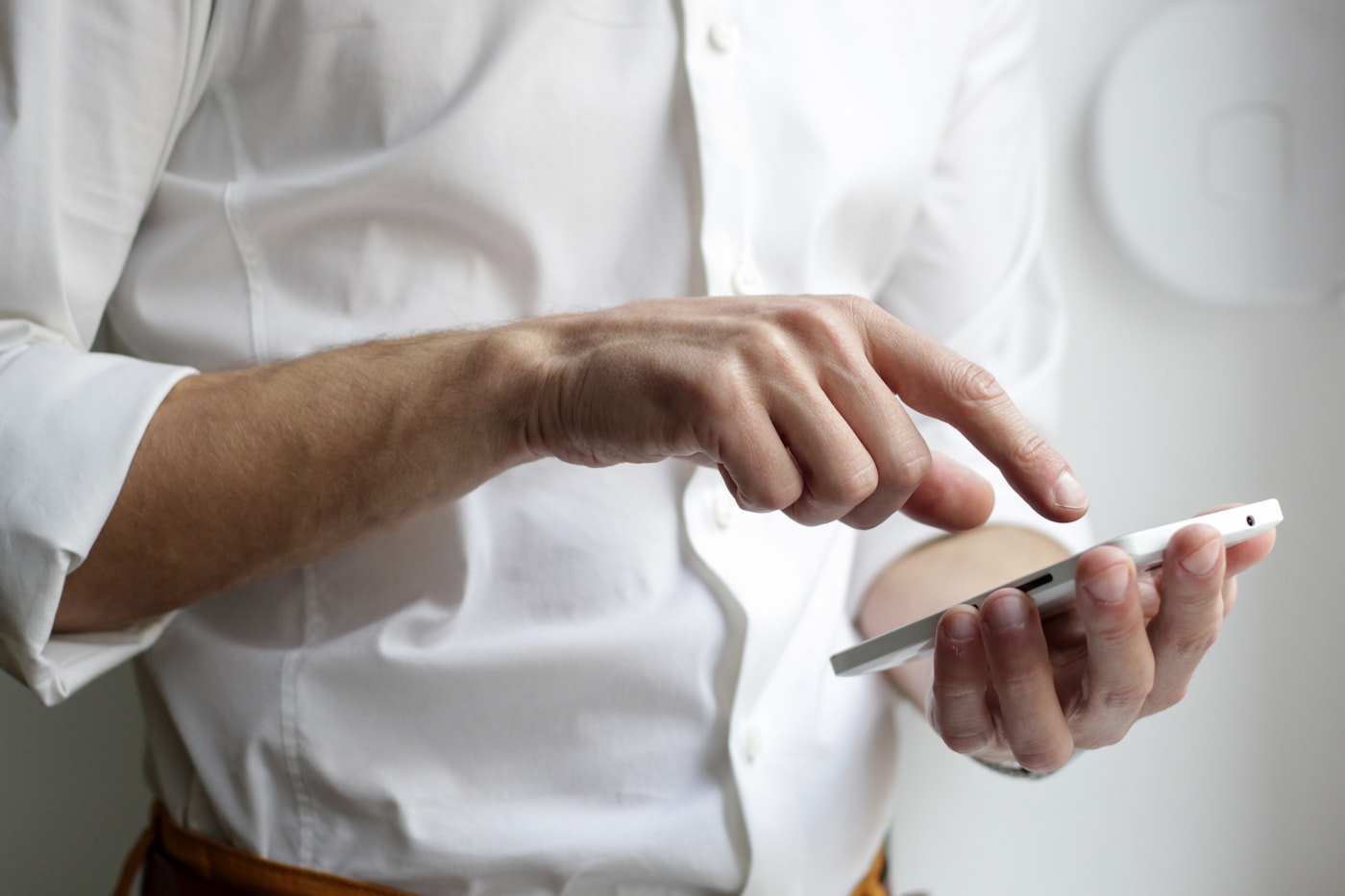 Professional handling a customer call from a modern workspace